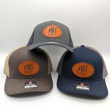 Load image into Gallery viewer, Trucker Hat with MAS Effects Leatherette Patch
